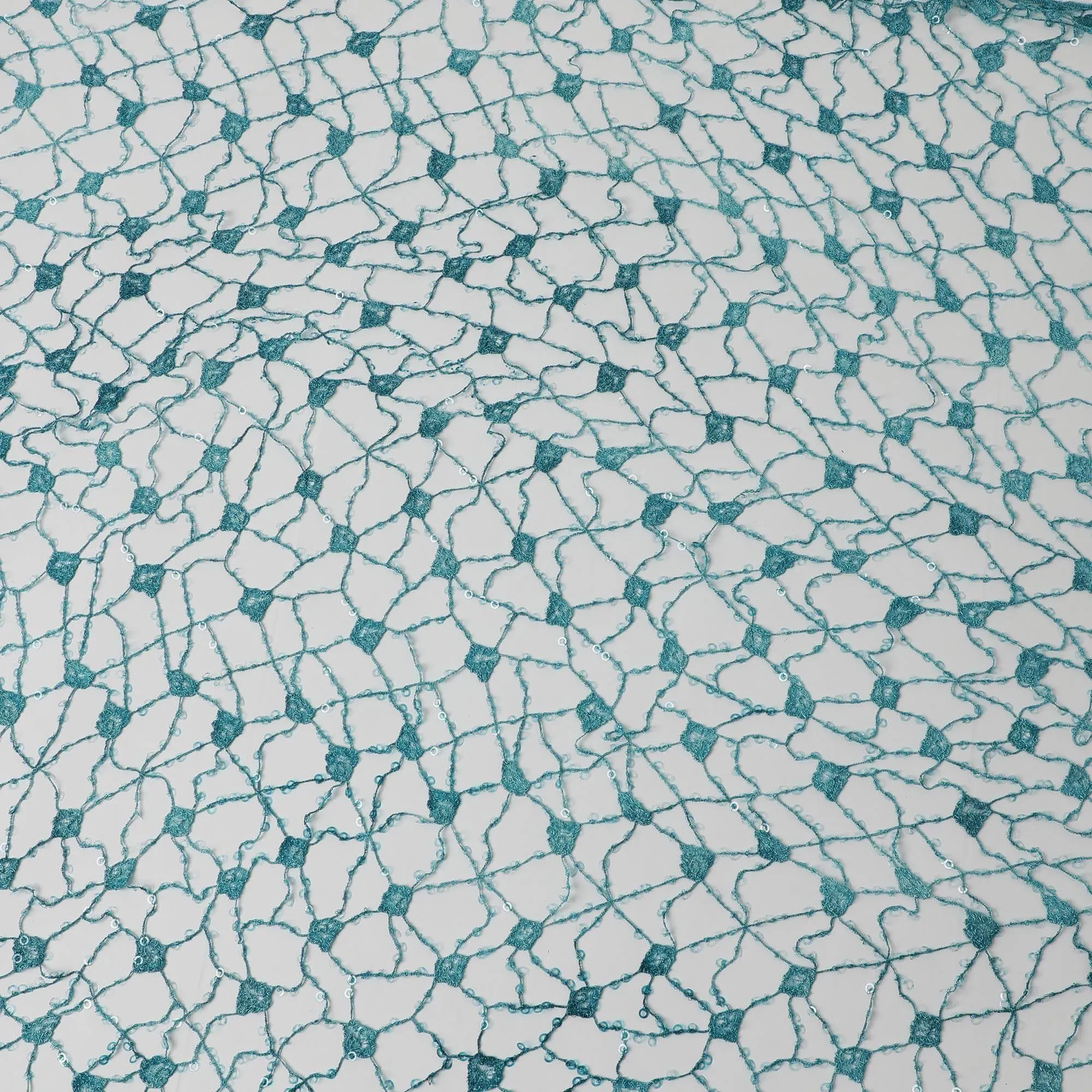 Aqua blue guipure chemical lace fabric with transparent sequins in web design