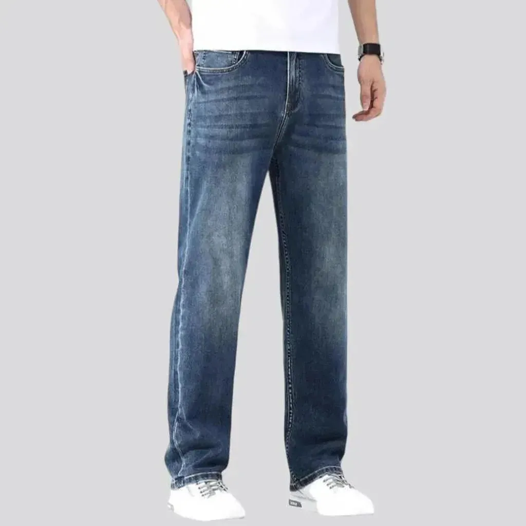 Stonewashed whiskered jeans
 for men