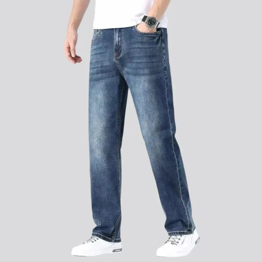 Stonewashed whiskered jeans
 for men