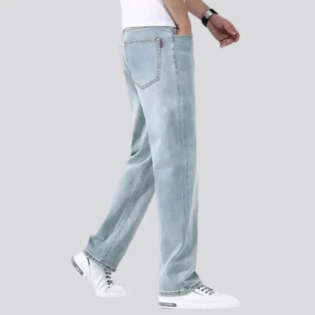 Stonewashed whiskered jeans
 for men