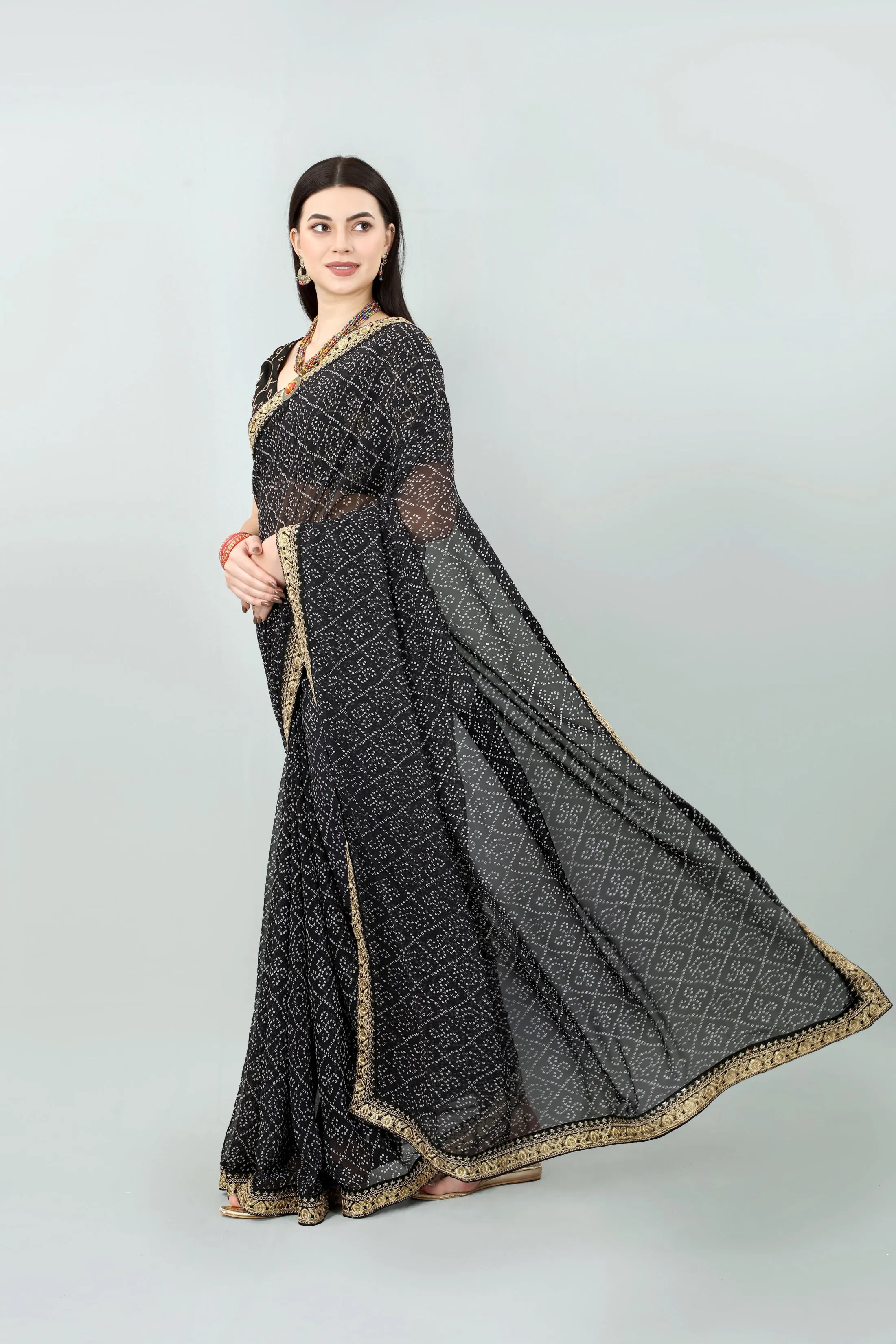 Women Party Wear Bandhani Printed Black Colour Georgette Saree Collection